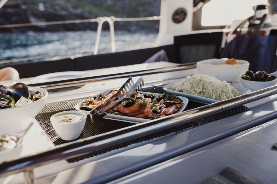 Santorini: Private Caldera Sailing Trip with Open Bar & Meal - The hot springs: a swim with a geothermal twist