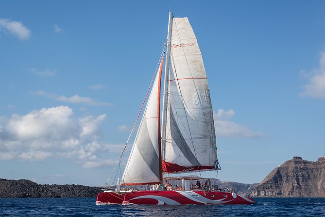 Santorini Sailing Dream Catcher with BBQ Lunch and Drinks - Sailing past Indian Head Mountain and the lighthouse