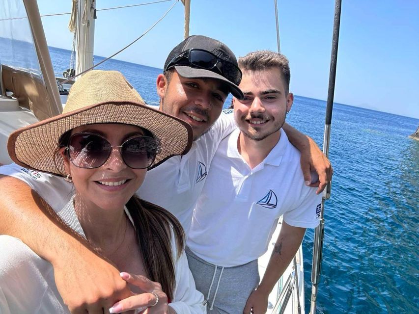 Santorini: Sunset Sailing Cruise, with Dinner and Drinks - White Beach, Indian Rocks, and the Akrotiri Lighthouse
