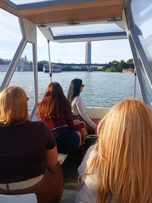 Seville: Sail the River. 100% private - Triana Bridge and the old port views