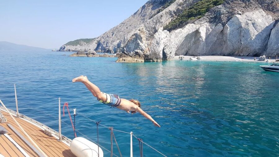 Skiathos: Day-Sailing Tour with Lunch on Board - Lunch below deck, with a proper Greek spread
