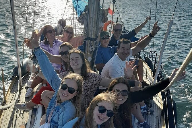 Small Group Sailboat Sunset Tour in Lisbon with a Drink - A Welcome Drink Before Lisbon Turns Gold