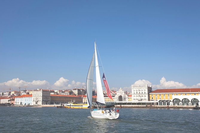 Small-Group Sailing Tour on the Tagus River from Lisbon - St. George’s Castle appears above the city