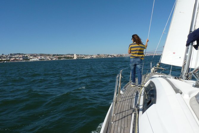 Small-Group Sailing Tour on the Tagus River from Lisbon - The Christ statue completes the wide city view