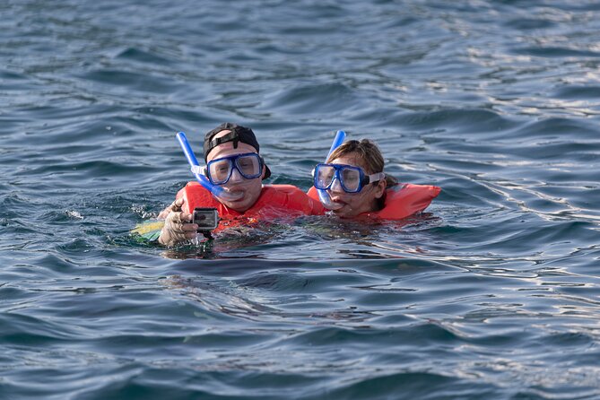 Snorkel & Sunset Sail in Cabo San Lucas - Booking, weather, and cancellation details