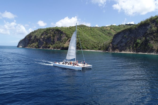 St Lucia Catamaran Day Sailing and Sightseeing Tour - Crew, music, and the large-group tradeoff