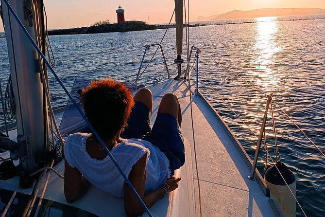 Sunset aperitif on a sailing boat in Alghero - Snacks, Sardinian wine, and the easy social mood