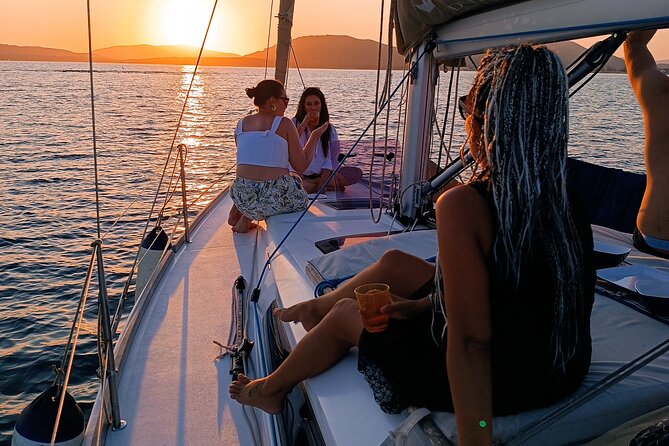 Sunset aperitif on a sailing boat in Alghero - La Maddalenetta and the swim in Alghero Bay