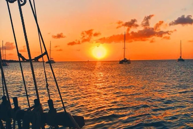 Sunset & Champagne Cruise on a Classic Schooner with boat dogs - Setting out from Grand Anse Bay at 4:30 pm
