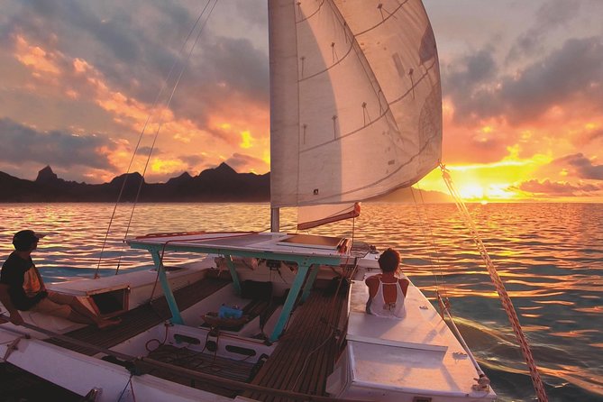 Sunset Cruise : Moorea Sailing on a Catamaran named Taboo - Leaving Mareto Public Beach for the reef