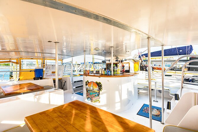 Sunset Dolphin Sail Aboard the Privateer Catamaran - A crew that shapes the mood
