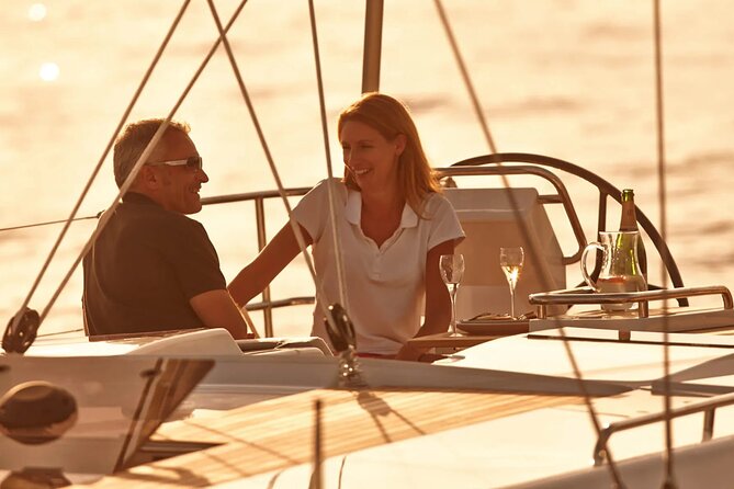 Sunset On A Luxury Sailboat From Port Olimpic - A friendly captain and easy onboard atmosphere