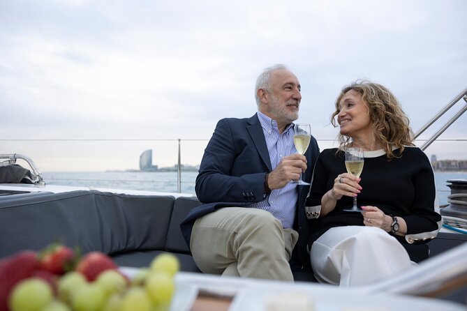 Sunset On A Luxury Sailboat From Port Olimpic - Dress for the breeze, not just the forecast