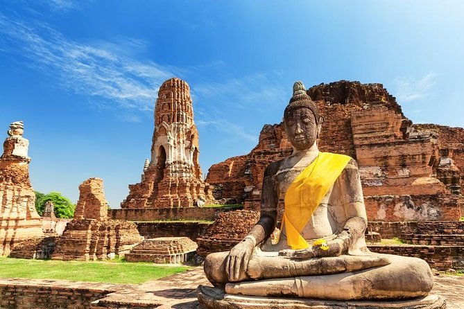Sunset Sail, Glittering Tempels at Afternoon Ayutthaya Tours - Wat Mahathat and the Buddha head in the roots