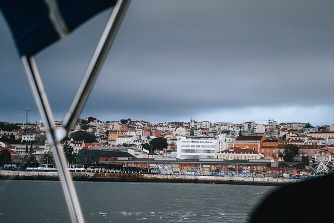 Sunset Sailboat Tejo River Tour 2h - Returning to Alcântara with a drink