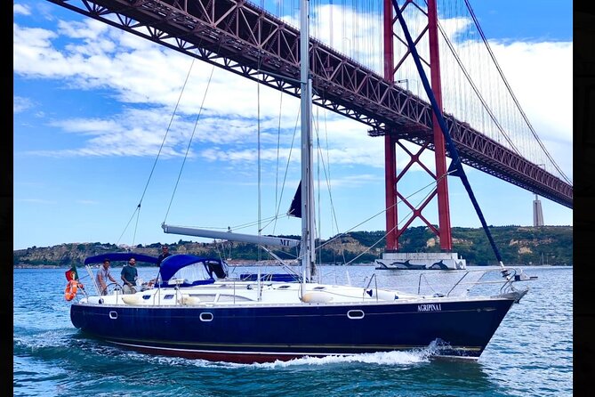 Sunset sailboat tour in Lisbon with green wine - The Discoveries Monument and Belém Tower