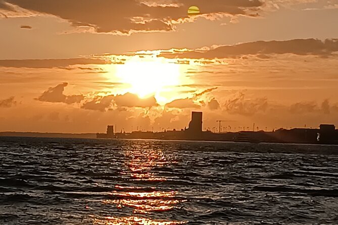 Sunset sailing boat trip in Lisbon with snacks - The opening run past Lisbon’s historic center