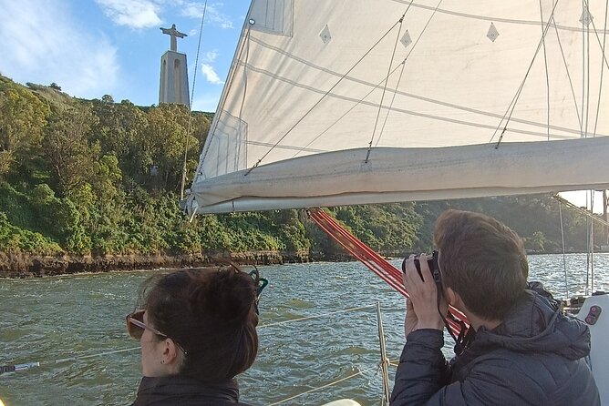 Sunset sailing boat trip in Lisbon with snacks - The 25 de Abril Bridge and Cristo-Rei views