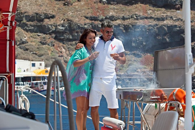 Sunset Sailing Catamaran Cruise in Santorini with BBQ and Drinks - Hotel pickup makes the port connection easy