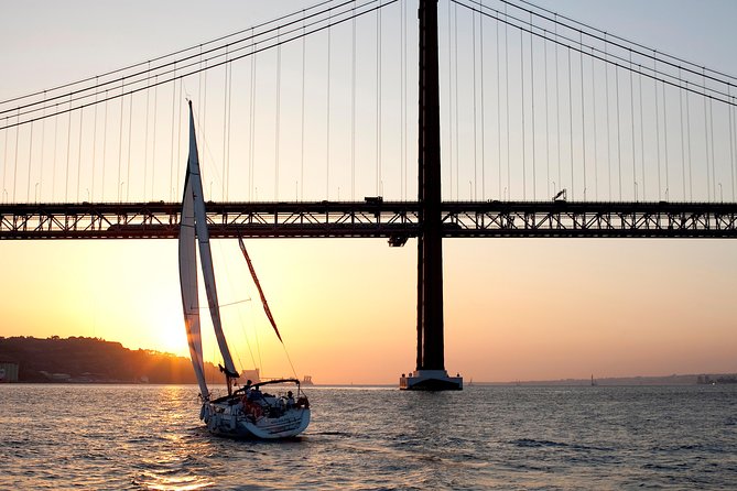 Sunset Sailing Tour On The Tagus River - Passing beneath the 25th of April Bridge