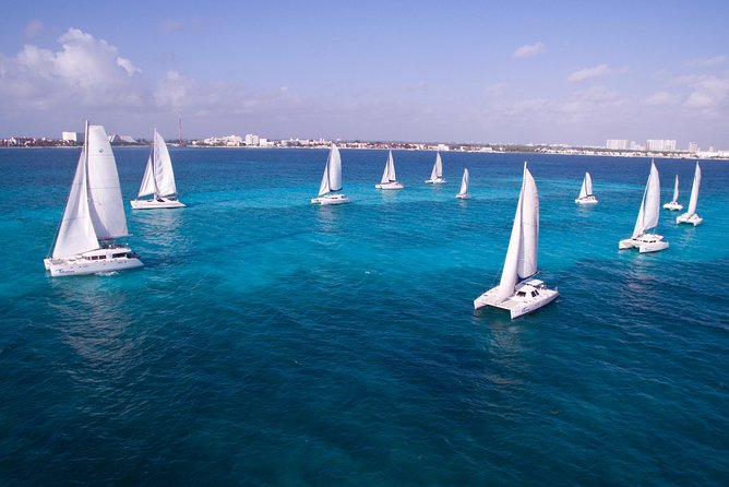 Top Sailing to Isla Mujeres with lunch and open bar from Cancun - Timing, pickup, and group size