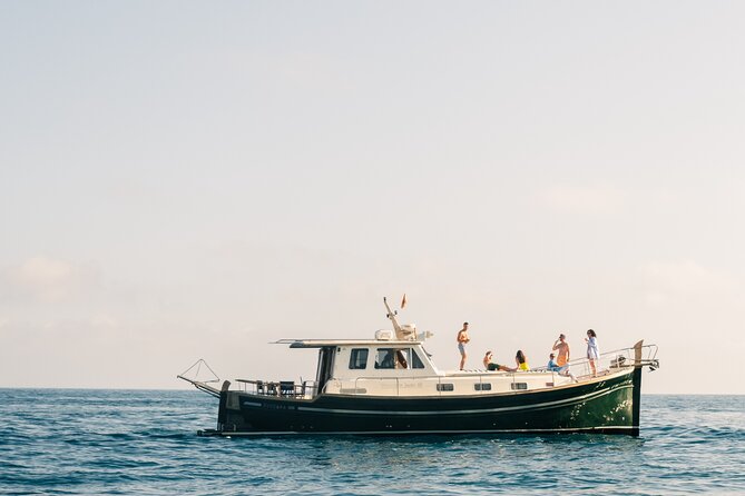 Traditional Boat Sailing Tour from Port of Palma - Swimming stops with enough time to enjoy them