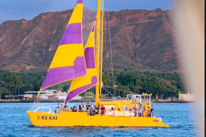 Waikiki Beach Sunset Sail - A sunset sail with a party-boat personality