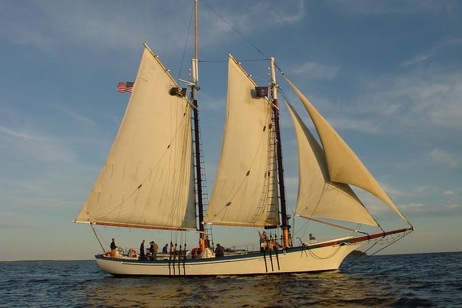 Windjammer Classic Sunset Sail from Camden, Maine - Raising the sails with the crew